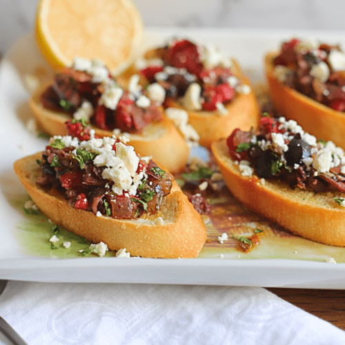 crostini with Greek mixture topped with feta cheese