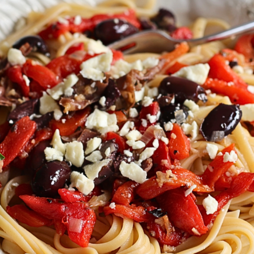 Greek pasta dish with kalamata olives, red peppers, feta