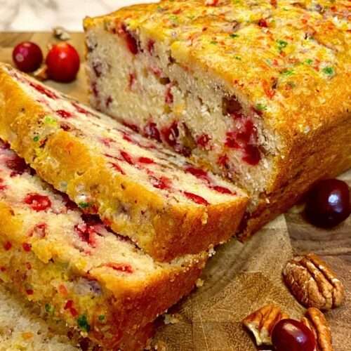 cranberry nut bread loaf with slices cut